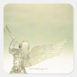 Glass angel playing trumpet, rear view sticker