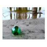 Glass float under pier postcards