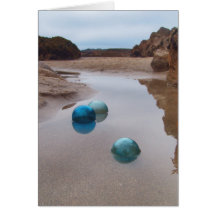 Glass floats on receding water greeting cards