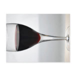 Glass of red wine postcard