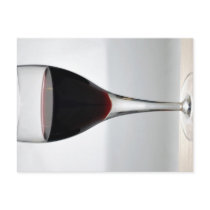 Glass of red wine postcard