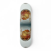 Glass tumbler filled with scotch and ice cubes skateboard deck