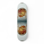 Glass tumbler filled with scotch and ice cubes skateboard deck