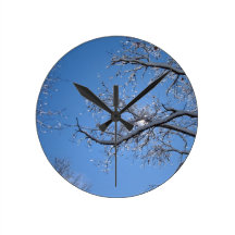 Glittering Ice and Snow Covered Trees Clocks