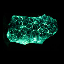 Glowing green crystals posters