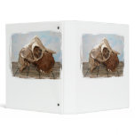Goat skull on bamboo matt against blue back binders