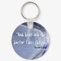 "God > Doctor" keychains