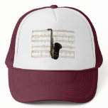 Gold and Black Saxophone On Sheet Music On Hat