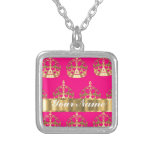Gold crowns on hot pink custom jewelry