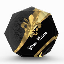 Gold fleur de lys on black award