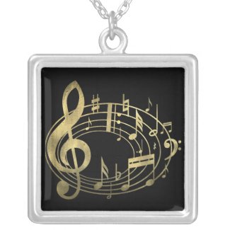 Golden musical notes in oval shape necklace