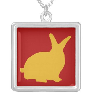 Golden Rabbit Silhouette on Red On Silver Necklace necklace