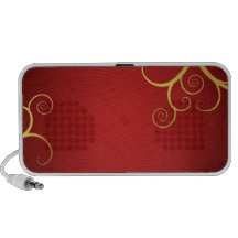 Golden swirls on deep red notebook speaker