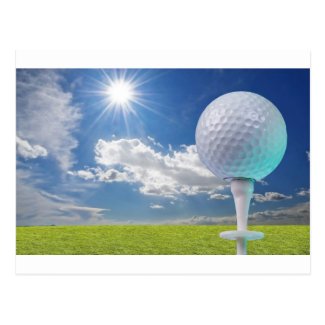 golf ball on a tee with grass postcards