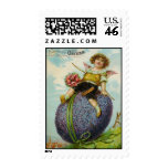 Gorgeous Antique post office Card Cupid on Easter  Postage Stamps