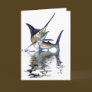 Great marlin with reflection in water