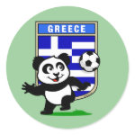 This adorable little panda is too cute! He's featured in front of a large flag from Greece and ready to play football and score some goals. This cute design is perfect for football players and soccer fans.