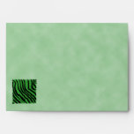 Green and black abstract jungle pattern. envelopes