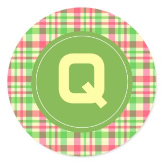 Green and pink plaid with "Q" monogram