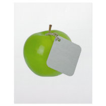 Green apple with metal tag letterhead