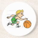 Green boy dribbling ball