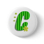 green C monogram buttons
