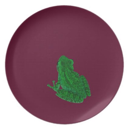 green colorized frong against burgundy party plates