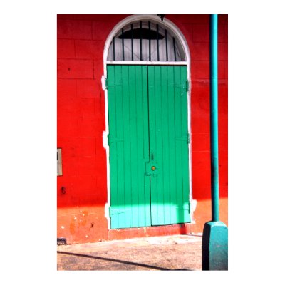 Green door and red wall, New Orleans Poster by drjwtaylor