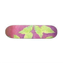 Green leaves on purple skateboard deck