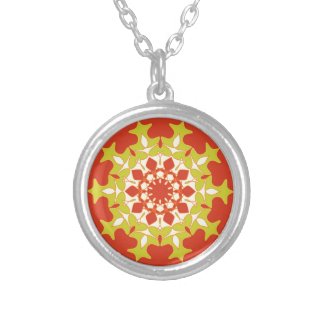 Green mandala on orange pendants