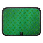 Green shamrock's on green background planner