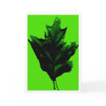 Greeting Card:  Autumn leaf on green background