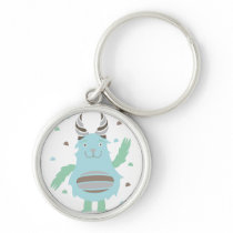 Greetings from a friendly blue monster key chains