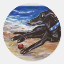 Greyhound by the sea round stickers
