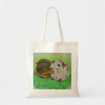 guinea pigs sharing a carrot bag