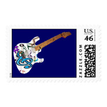 guitar made of musical notes on a postage stalmp postage