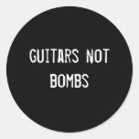 guitars not bombs round stickers