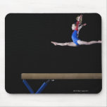 Gymnast (9-10) leaping on balance beam 2 mousepads