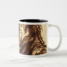 Half length portrait of a man bending over coffee mug