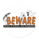 round_sticker - Halloween Beware T-shirts, sweatshirts, bodysuits, mugs, cards, stickers, trick or treat tote bags, and other Halloween clothing and gifts with a ghost and bat design that warns to beware the ghosts and goblins that are everywhere!: Sizes 