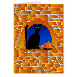 Halloween black cat and pumpkins greeting card