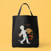 Halloween mummy  costume with candy bag.