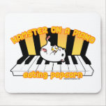 Hamster on a piano eating popcorn mouse pads