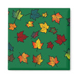 Hand-drawn autumn leaves on green magnet