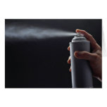 Hand holding Aerosol spray can Cards by inspirelove