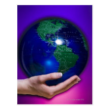 Hand holding earth post cards