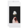 Hand holding white rose bud black background full color rack card