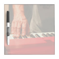 hand playing red keyboard male musician dry erase boards