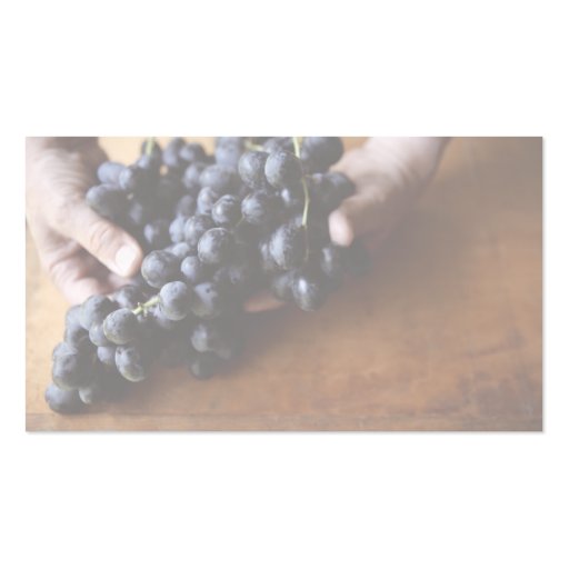 hands holding grapes business card (front side)