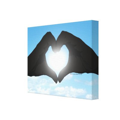 Hands in Heart Shape Silhouette on Blue Sky Canvas Print